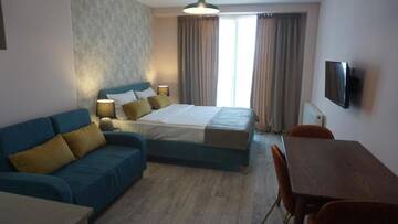 Фото номера Номер-студио с кроватью размера &quot;king-size&quot; Отель New Gudauri Residences and Spa г. Гудаури 7