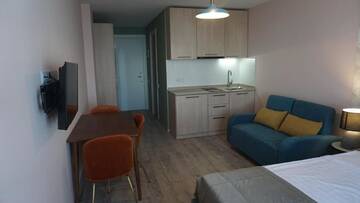 Фото номера Номер-студио с кроватью размера &quot;king-size&quot; Отель New Gudauri Residences and Spa г. Гудаури 9