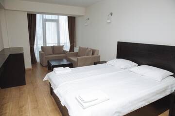 Фото номера Номер-студио с кроватью размера &quot;king-size&quot; Отель New Gudauri Residences and Spa г. Гудаури 17
