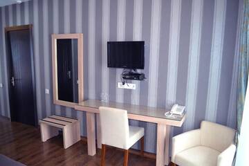 Фото номера Стандартный одноместный номер Отель Edelweiss Hotel г. Гудаури 5