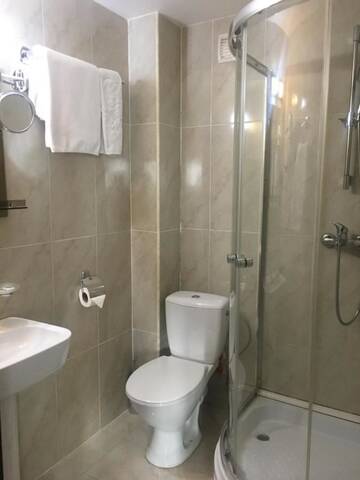 Фото номера Стандартный двухместный номер с 1 кроватью Отель Edelweiss Hotel г. Гудаури 5
