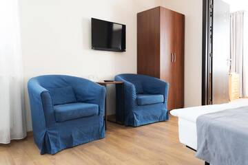 Фото номера Семейный номер с балконом Отель Monte Hotel г. Гудаури 27