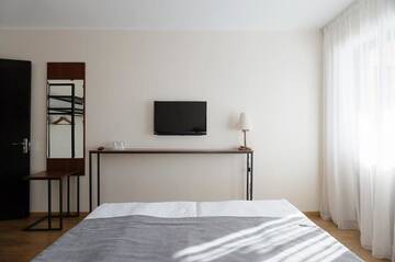 Фото номера Семейный номер с балконом Отель Monte Hotel г. Гудаури 32