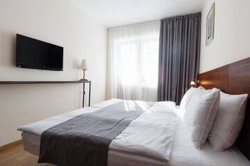 Фото номера Семейный номер с балконом Отель Monte Hotel г. Гудаури 28