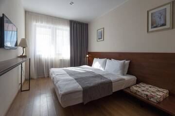 Фото номера Семейный номер с балконом Отель Monte Hotel г. Гудаури 29