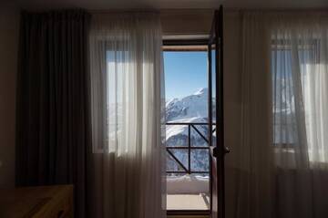 Фото номера Семейный номер с балконом Отель Monte Hotel г. Гудаури 30