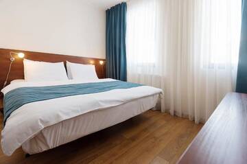 Фото номера Семейный номер с балконом Отель Monte Hotel г. Гудаури 3