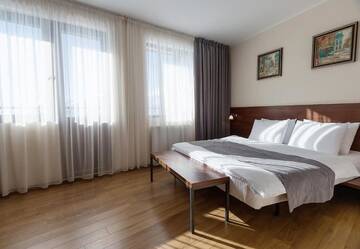 Фото номера Семейный номер с балконом Отель Monte Hotel г. Гудаури 7