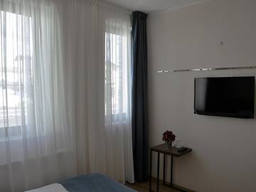 Фото номера Семейный номер с балконом Отель Monte Hotel г. Гудаури 12