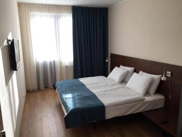 Фото номера Семейный номер с балконом Отель Monte Hotel г. Гудаури 8