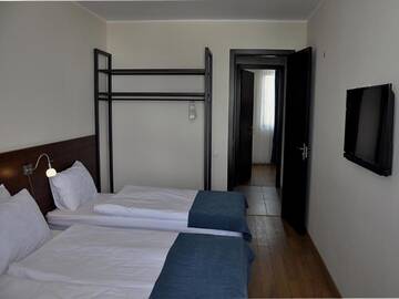 Фото номера Семейный номер с балконом Отель Monte Hotel г. Гудаури 10