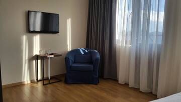 Фото номера Семейный номер с балконом Отель Monte Hotel г. Гудаури 21