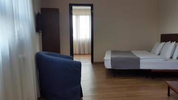 Фото номера Семейный номер с балконом Отель Monte Hotel г. Гудаури 22