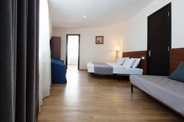 Фото номера Семейный номер с балконом Отель Monte Hotel г. Гудаури 26