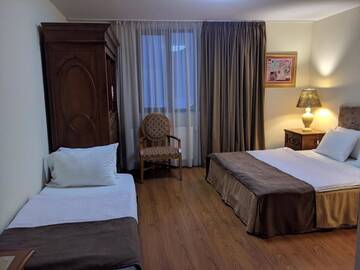 Фото номера Трехместный номер с балконом Отель Shino Hotel г. Гудаури 5