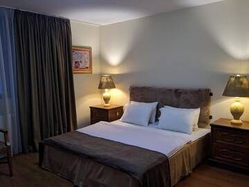 Фото номера Трехместный номер с балконом Отель Shino Hotel г. Гудаури 6