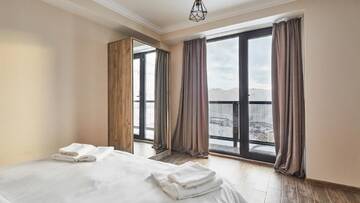 Фото номера Четырехместный номер «Премиум» Отель Gudauri Hotel Loft г. Гудаури 5