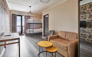 Фото номера Семейный номер Отель Gudauri Hotel Loft г. Гудаури 2