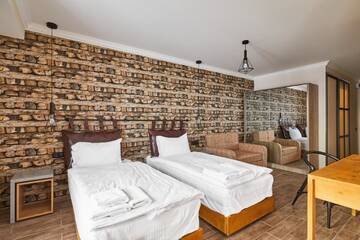 Фото номера Четырехместный номер «Премиум» Отель Gudauri Hotel Loft г. Гудаури 2