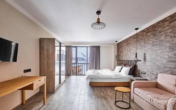 Фото номера Трехместный номер Отель Gudauri Hotel Loft г. Гудаури 5