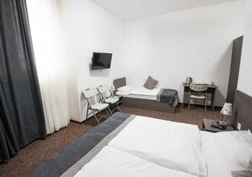 Фото номера Трехместный номер Отель Time Out Hotel г. Гудаури 3