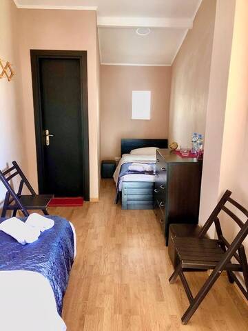 Фото номера Двухместный номер с 2 отдельными кроватями Гостевой дом Veranda Hotel г. Гудаури 9
