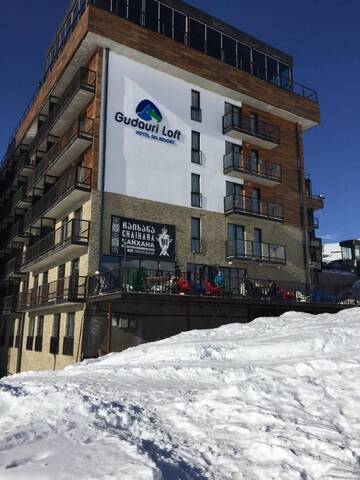 Фото номера Апартаменты с балконом Апарт-отели Gudauri Loft Apartment 311 г. Гудаури 24