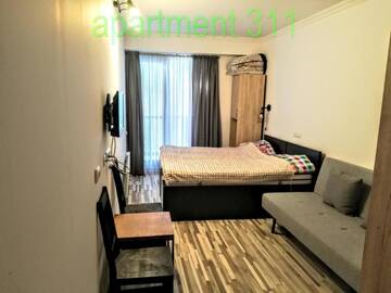 Фото номера Апартаменты с балконом Апарт-отели Gudauri Loft Apartment 311 г. Гудаури 9