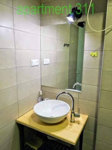 Фото номера Апартаменты с балконом Апарт-отели Gudauri Loft Apartment 311 г. Гудаури 10