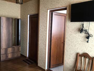 Фото номера Трехместный номер с видом на горы Гостевой дом Hillsite Gudauri г. Гудаури 5