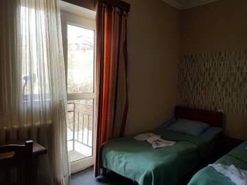 Фото номера Четырехместный номер Гостевой дом Hotel Shele г. Гудаури 4