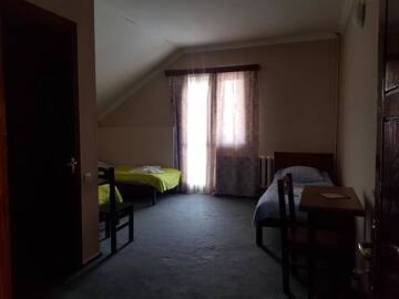 Фото номера Классический трехместный номер Гостевой дом Hotel Shele г. Гудаури 11