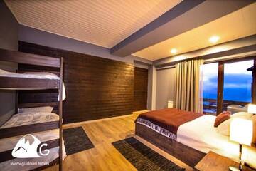 Фото номера Апартаменты с видом на горы Апарт-отели Gudauri Travel Apartments in Suites (New Gudauri) г. Гудаури 4