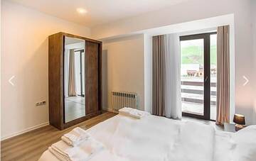 Фото номера Апартаменты с видом на горы Апарт-отели Gudauri Travel Apartments in Suites (New Gudauri) г. Гудаури 3