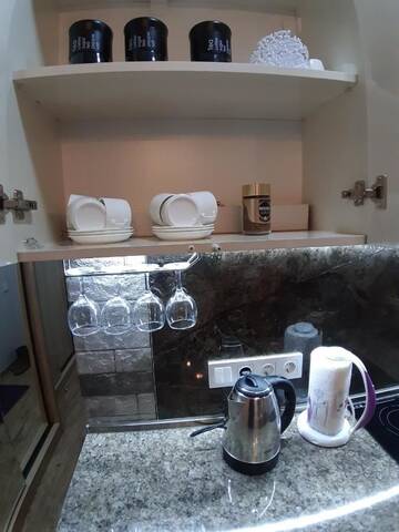 Фото номера Четырехместный номер с балконом Отель New Gudauri loft г. Гудаури 11