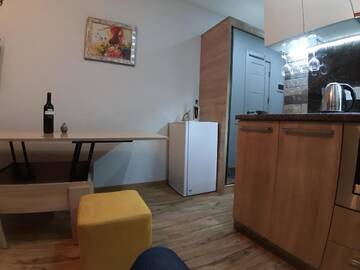 Фото номера Четырехместный номер с балконом Отель New Gudauri loft г. Гудаури 12