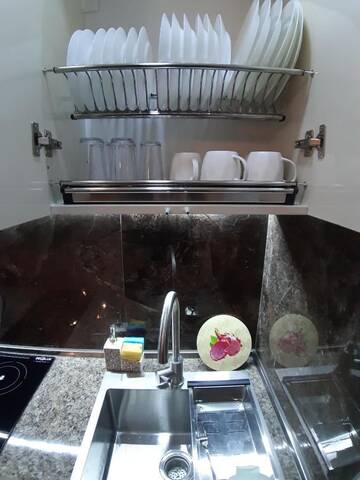 Фото номера Четырехместный номер с балконом Отель New Gudauri loft г. Гудаури 8