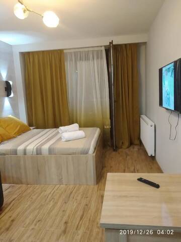Фото номера Четырехместный номер с балконом Отель New Gudauri loft г. Гудаури 19