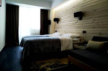 Фото номера Апартаменты с 2 спальнями Отель Gudauri Hills Apart Hotel г. Гудаури 3