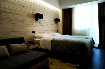 Фото номера Апартаменты с 2 спальнями Отель Gudauri Hills Apart Hotel г. Гудаури 6