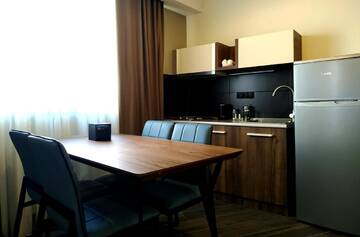 Фото номера Апартаменты с 2 спальнями Отель Gudauri Hills Apart Hotel г. Гудаури 9
