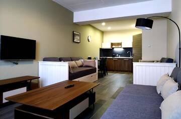 Фото номера Улучшенные апартаменты Отель Gudauri Hills Apart Hotel г. Гудаури 6