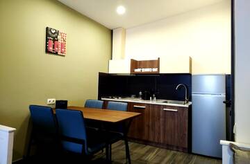 Фото номера Апартаменты Делюкс Отель Gudauri Hills Apart Hotel г. Гудаури 7