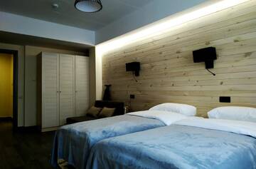 Фото номера Улучшенные апартаменты Отель Gudauri Hills Apart Hotel г. Гудаури 4