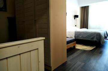 Фото номера Апартаменты с 2 спальнями Отель Gudauri Hills Apart Hotel г. Гудаури 4