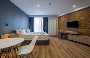 Фото номера Полулюкс с балконом Апарт-отели Gudauri, Atrium Suites г. Гудаури 5