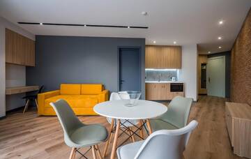 Фото номера Семейный номер с балконом Апарт-отели Gudauri, Atrium Suites г. Гудаури 6