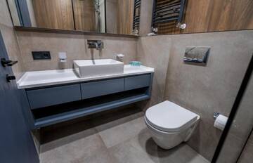 Фото номера Семейный номер с балконом Апарт-отели Gudauri, Atrium Suites г. Гудаури 4