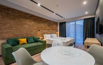Фото номера Номер-студио с балконом Апарт-отели Gudauri, Atrium Suites г. Гудаури 4